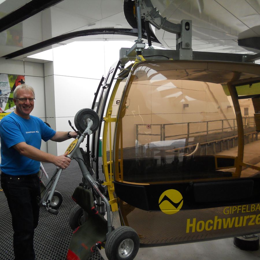 Mountaincart being loaded into a gondola