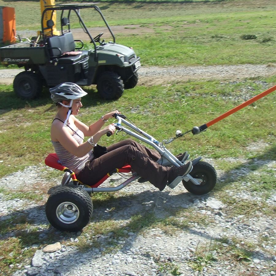 Mountaincart towed up by a service vehicle