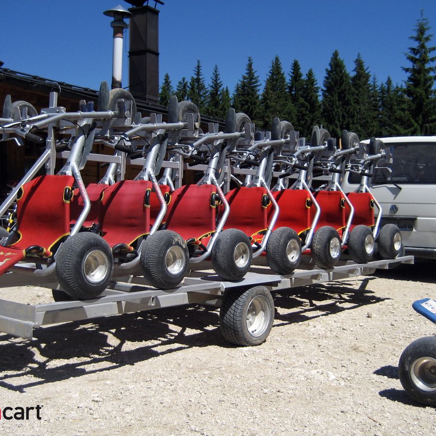 Mountaincarts stacked on a trailer