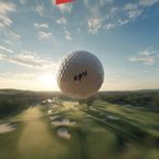 Golf ball on a fairway